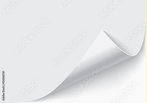 Page curl with shadow on blank sheet of paper.