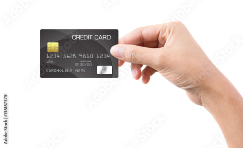 Female hand holding a bank card isolated on white background