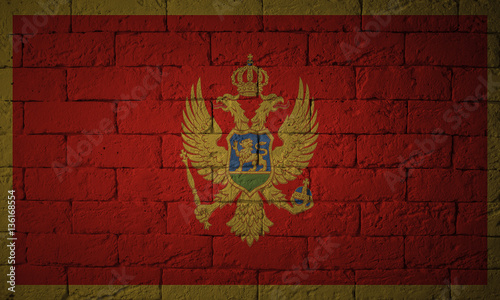 Flag with original proportions. Closeup of grunge flag of Montenegro