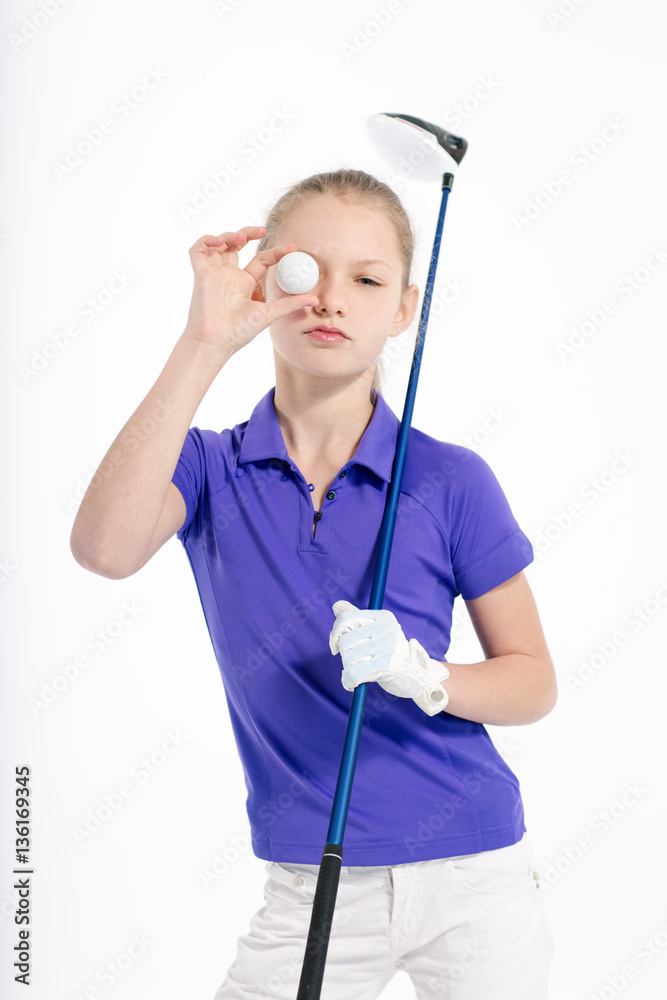 Pretty girl golfer posing with golf club on white backgroud in studio Pretty girl golfer posing with golf club on white backgroud in studio