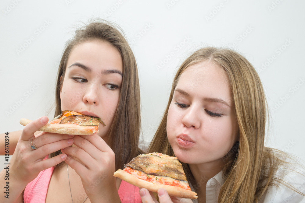 happy girls eats pizza on white background happy girls eats pizza on white background