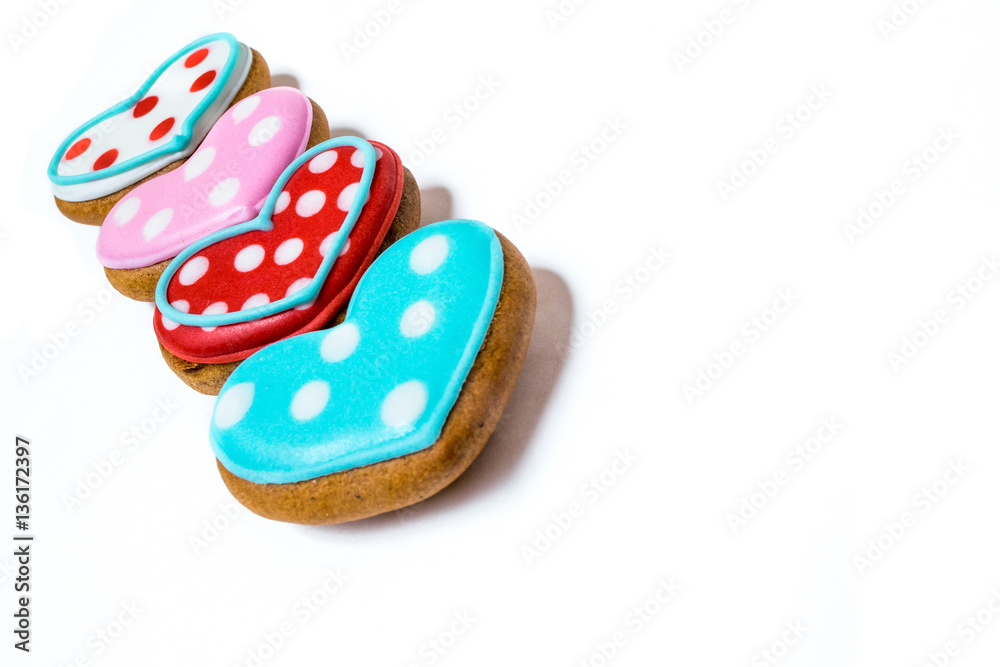 Heart shaped st. Valentine's cakes lay together on white background Heart shaped st. Valentine's cakes lay together on white background