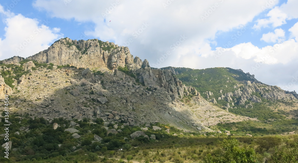 mountain landscape with clouds in the sky on a sunny summer day mountain landscape with clouds in the sky on a sunny summer day