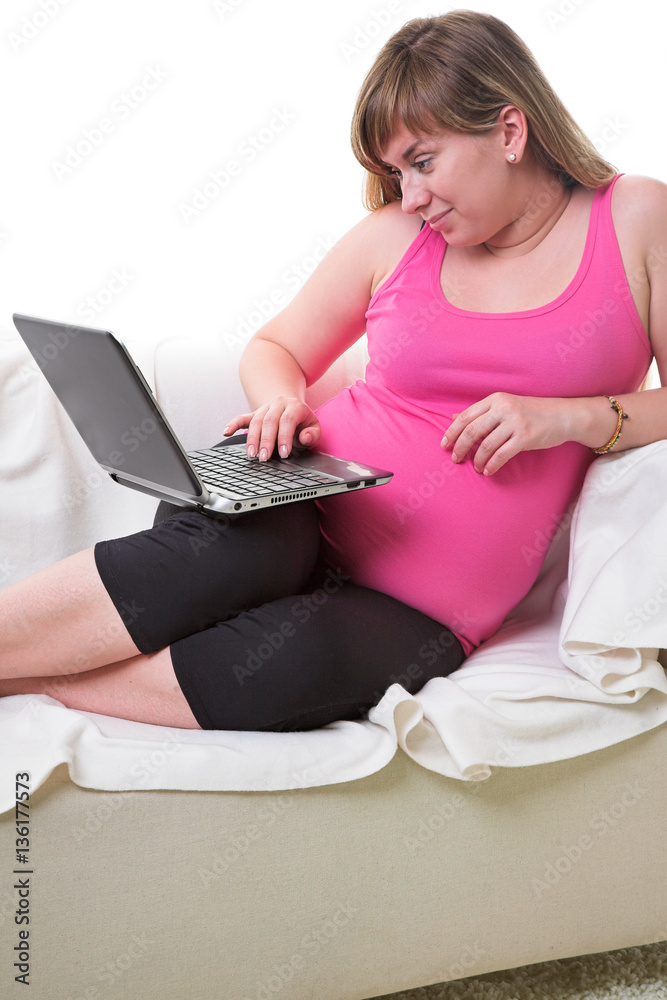 Fototapeta premium pregnant woman with laptop