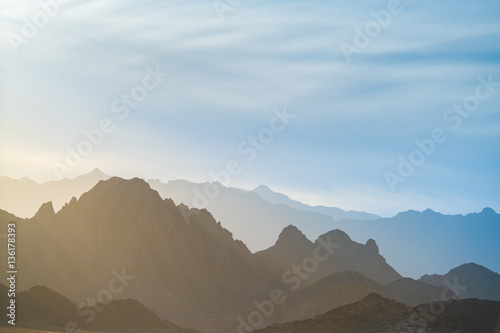 The beautiful mountain on the background of foggy sky