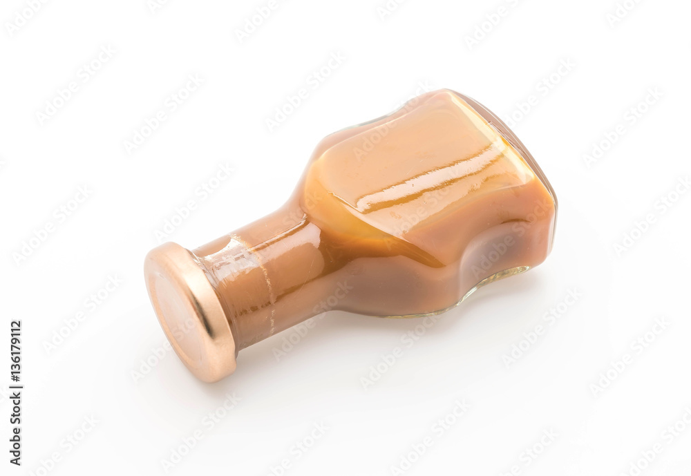 caramel bottle sauce on white caramel bottle sauce on white