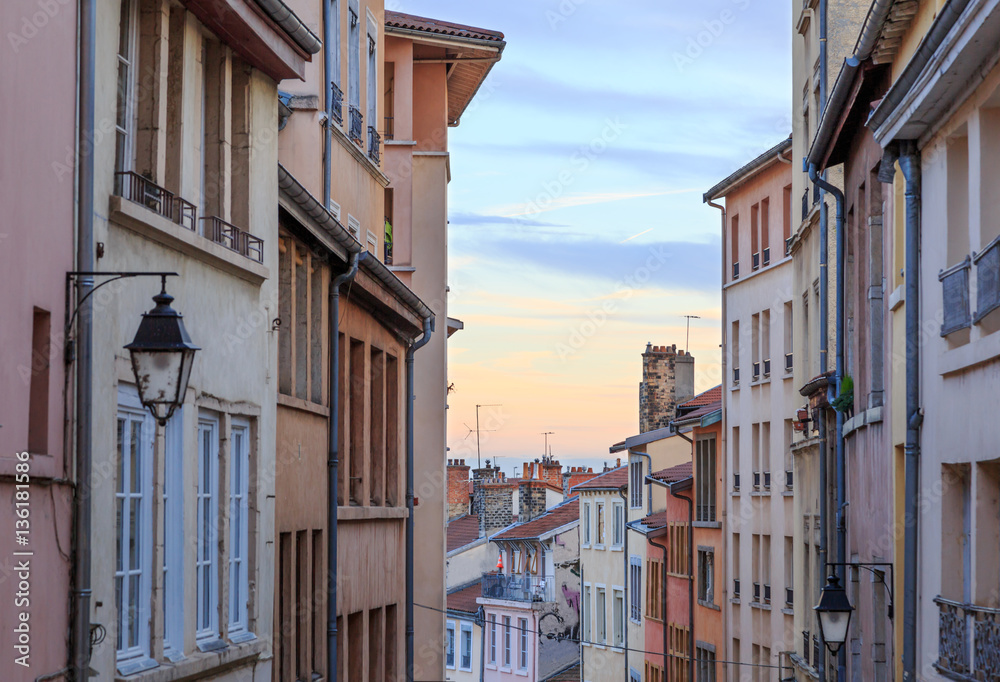 Old and colorful street in Croix Rousse, an old part of the city of Lyon, France.