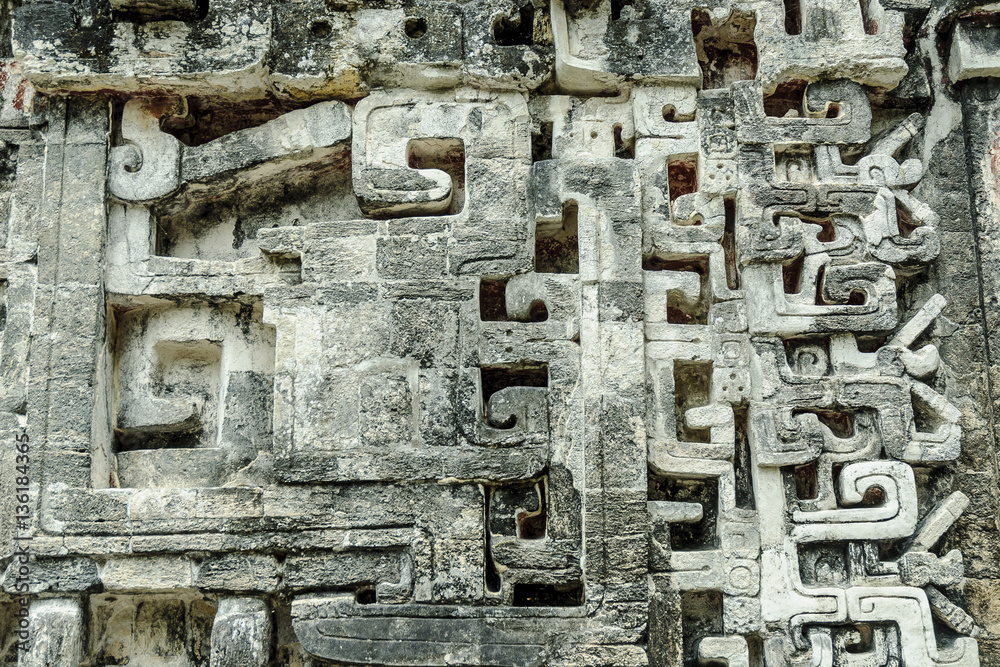 Mayan reliefs in the front of the house of the mouth of the snake in the archaeological place of Chicanna, in the reservation of the biosphere of Calakmul, Campeche, Mexico.