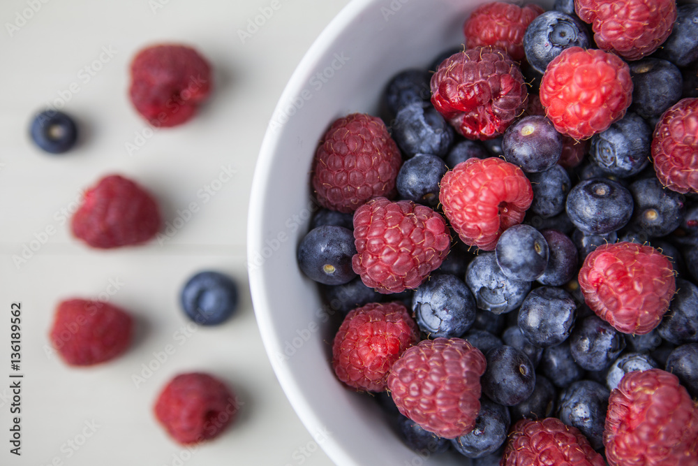 Fruit berries in bowl overhead Fruit berries in bowl overhead