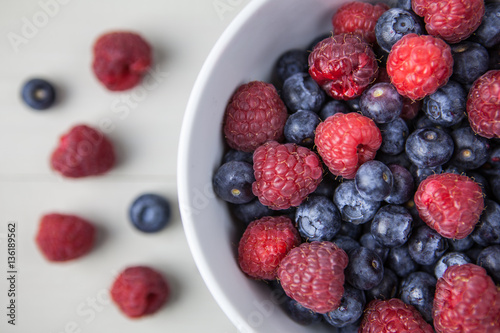 Fruit berries in bowl overhead