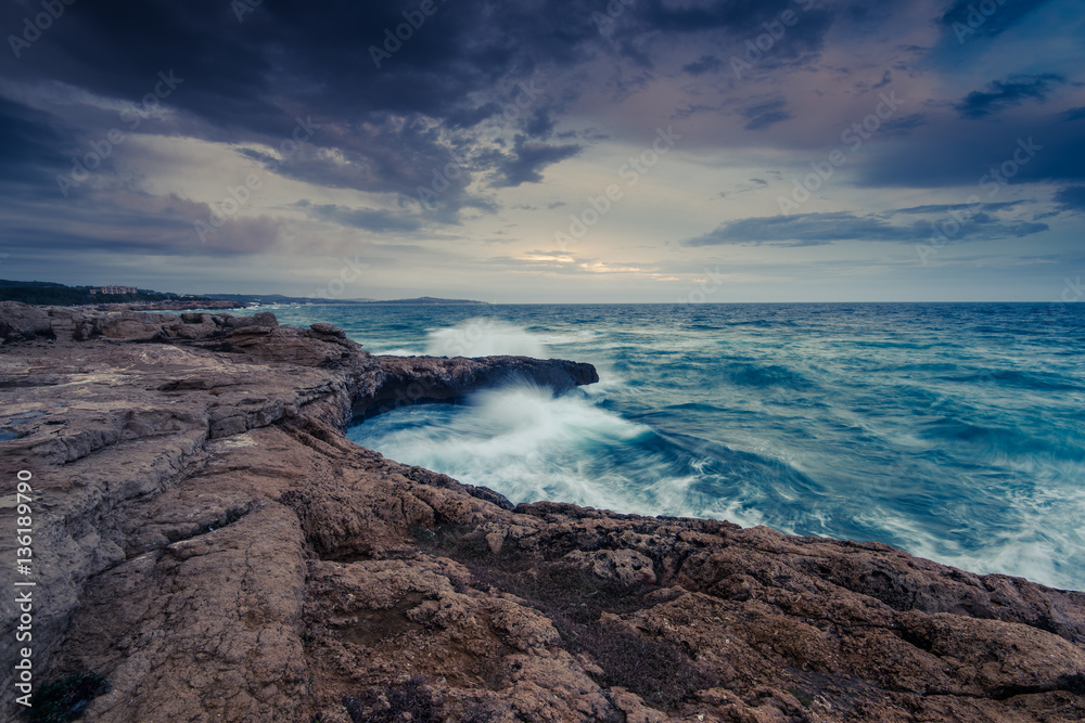 Rocky beach and cliffs at Mediterranean sea in Spain Rocky beach and cliffs at Mediterranean sea in Spain