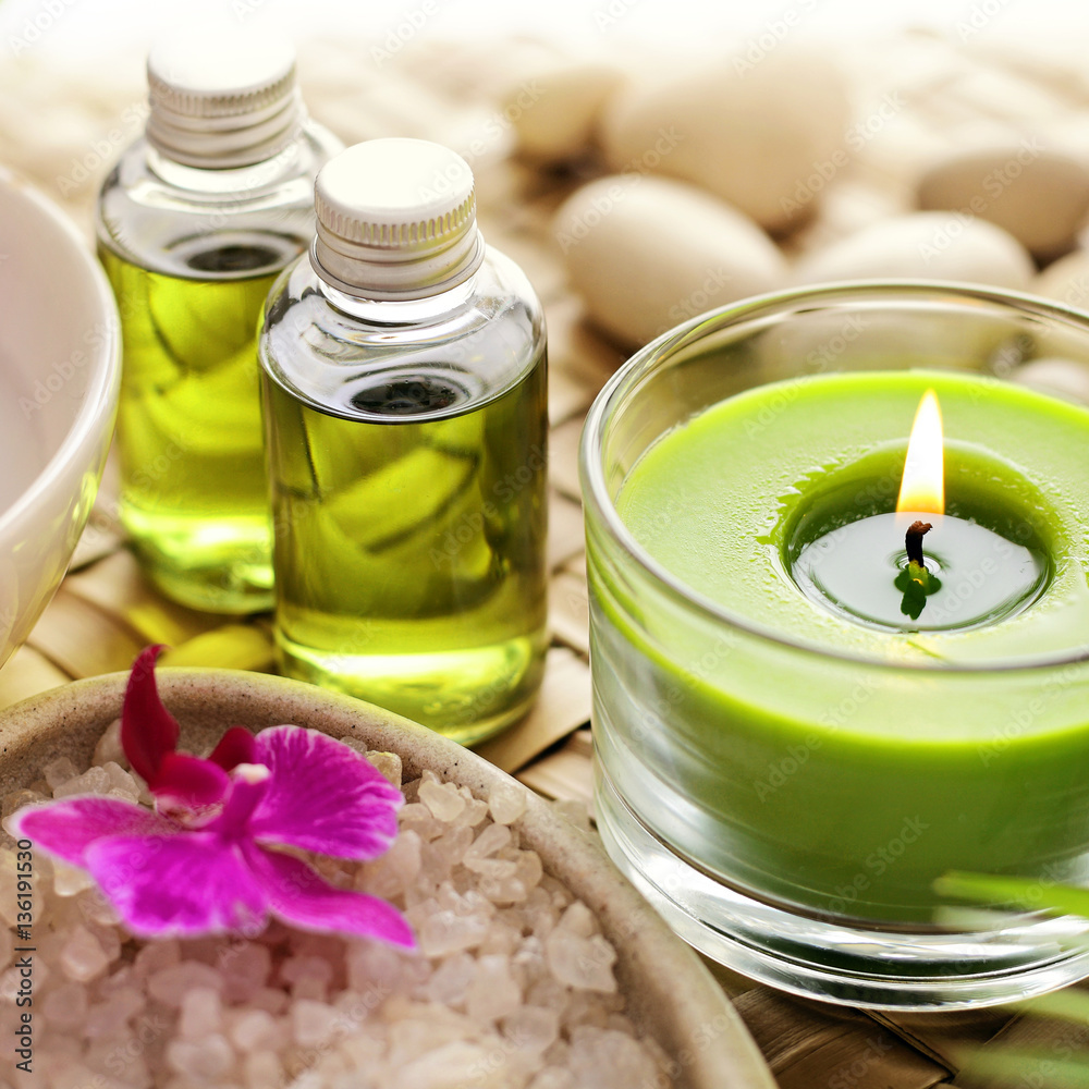 SPA still life. aromatherapy candle, essential oil and bath products SPA still life. aromatherapy candle, essential oil and bath products