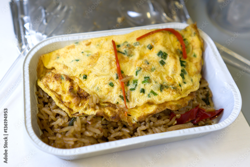 omelet or fried egg with hot fried rice.