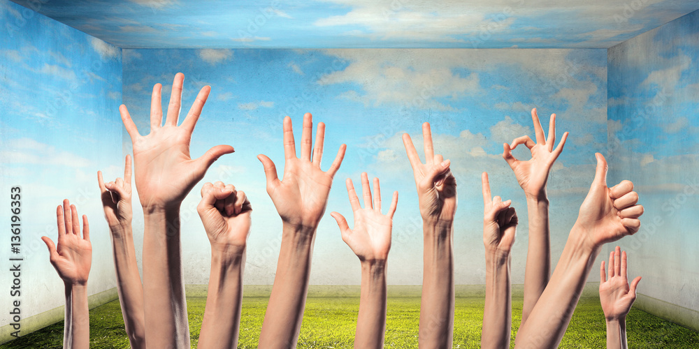 Group of people rise hands . Mixed media Group of people rise hands . Mixed media