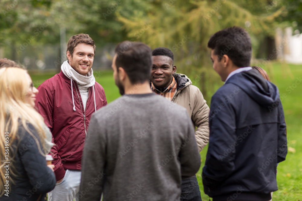 group of happy international friends outdoors group of happy international friends outdoors