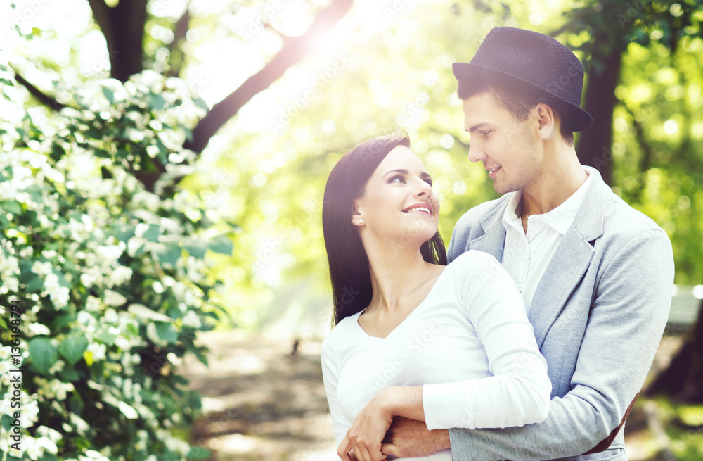 Young couple of hipsters having a date in the park. Love, relationship, dating: concept. Young couple of hipsters having a date in the park. Love, relationship, dating: concept.