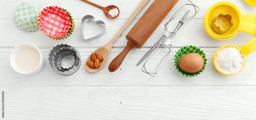 Baking ingredients on wooden table Baking ingredients on wooden table