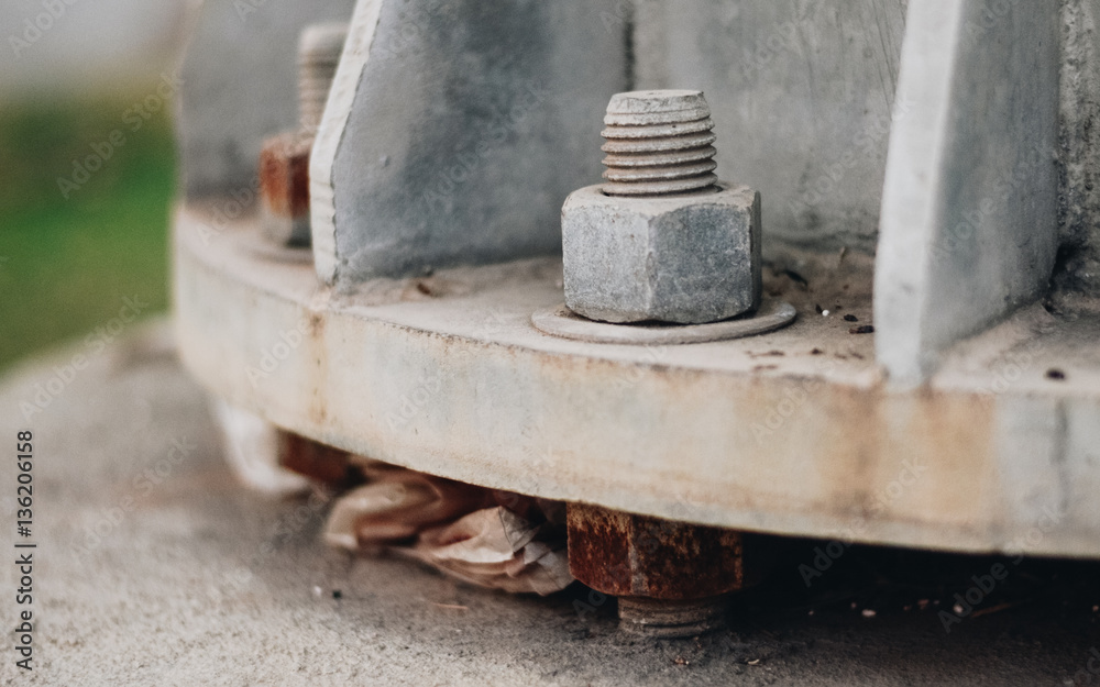 Nut screw mounting in the metal pipe.