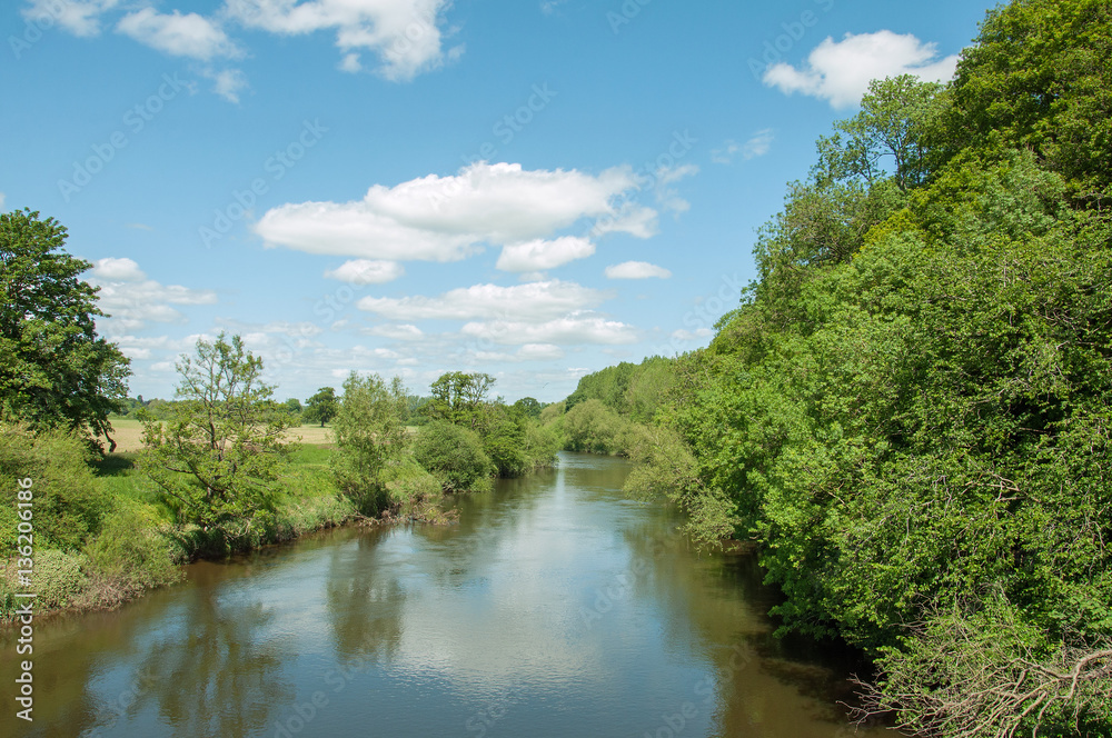 River Wye in the Herefordshire countryside of England. River Wye in the Herefordshire countryside of England.