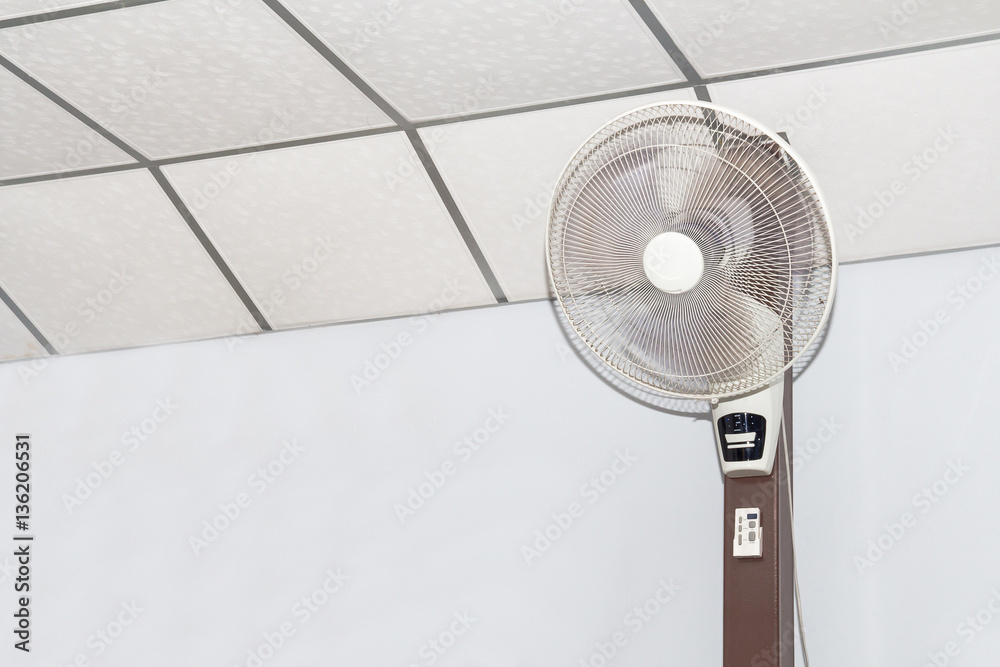 Fan on wall background in white room,conditioning Stock Photo | Adobe Stock