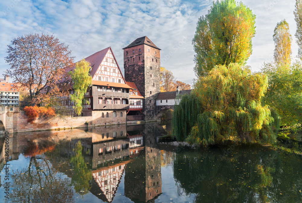 Old town of Nuremberg with half-timbered houses over Pegnitz river, Germany Old town of Nuremberg with half-timbered houses over Pegnitz river, Germany