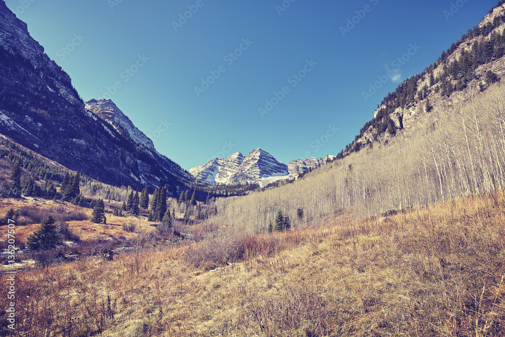 Vintage toned Maroon Bells mountain landscape, Aspen in Colorado, USA.