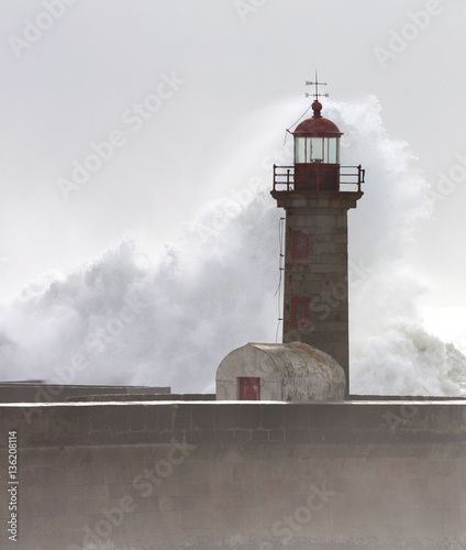 10 Meters Big Waves Over the "Felgueiras" Lighthouse in Oporto, Portugal, vertical shot 