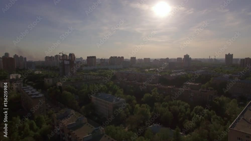 Aerial shot of residential district among the green trees in Moscow, Russia Aerial shot of residential district among the green trees in Moscow, Russia