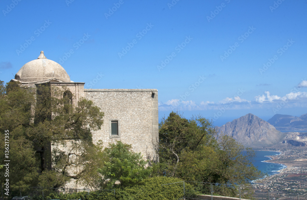 The church of St Giovani, in the town of Erice, overlooking the mountains and ocean below