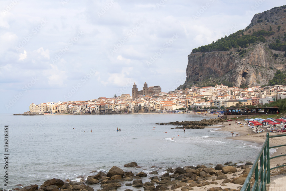 View of the town, beach and mountain of the ancient town of Cefalu, Sicily, Italy
