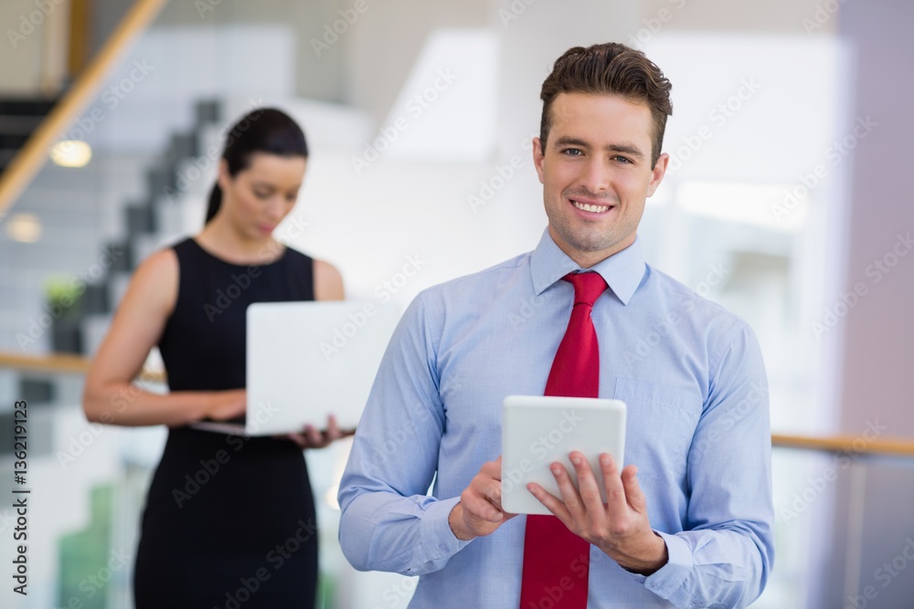 Businessman holding a digital tablet Businessman holding a digital tablet