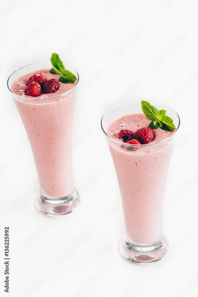 Raspberry smoothie with mango isolated on white background Raspberry smoothie with mango isolated on white background