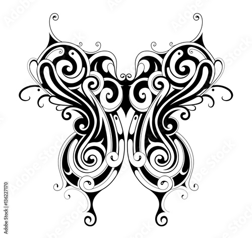 Tribal style butterfly tattoo