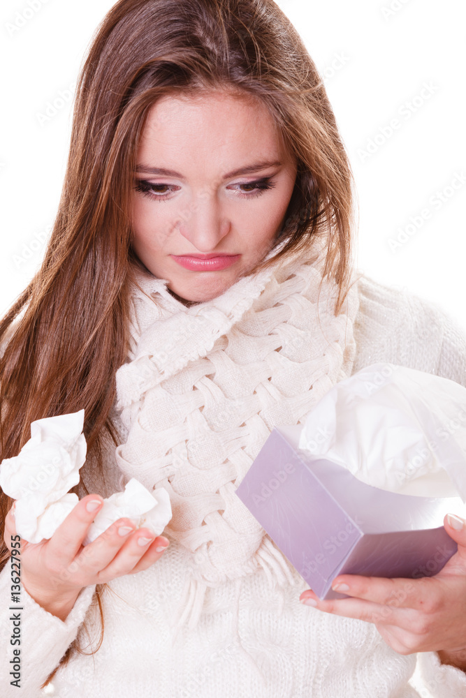 Sick woman girl with fever sneezing in tissue Sick woman girl with fever sneezing in tissue