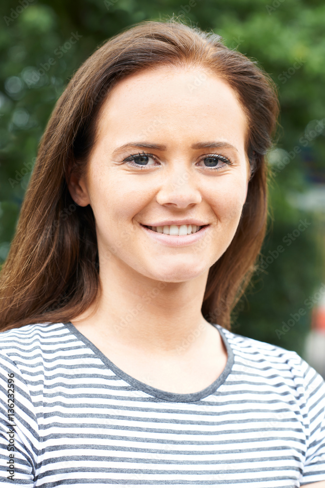Head And Shoulders Portrait Of Smiling Teenage Girl Head And Shoulders Portrait Of Smiling Teenage Girl