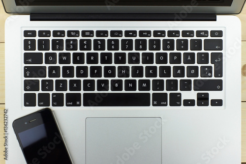 aluminum laptop and phone with a beautiful design Danish keyboard