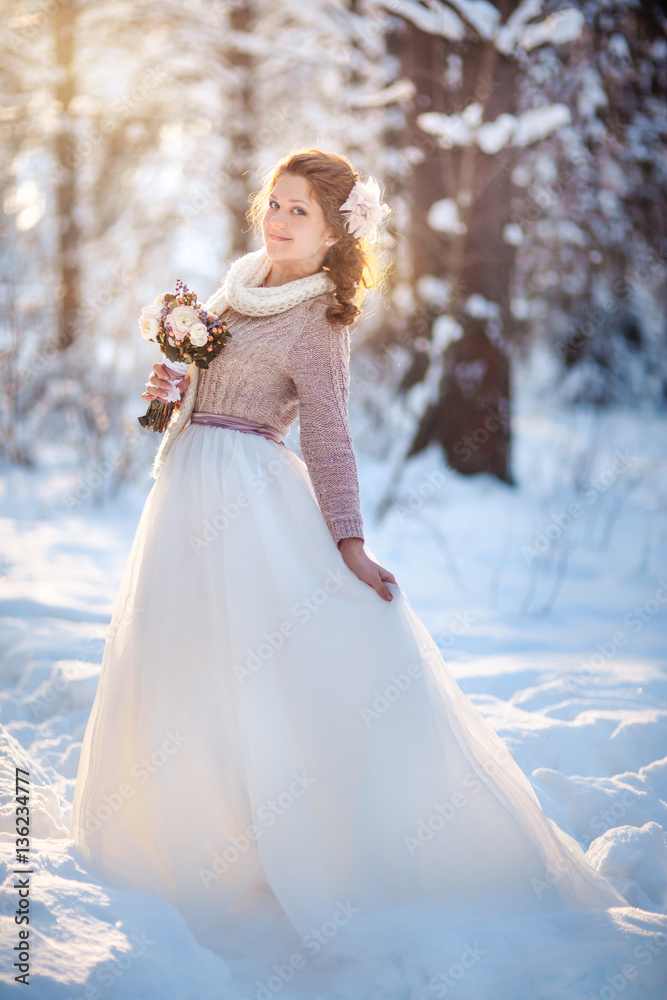 Beautiful bride in snowy winter forest Beautiful bride in snowy winter forest