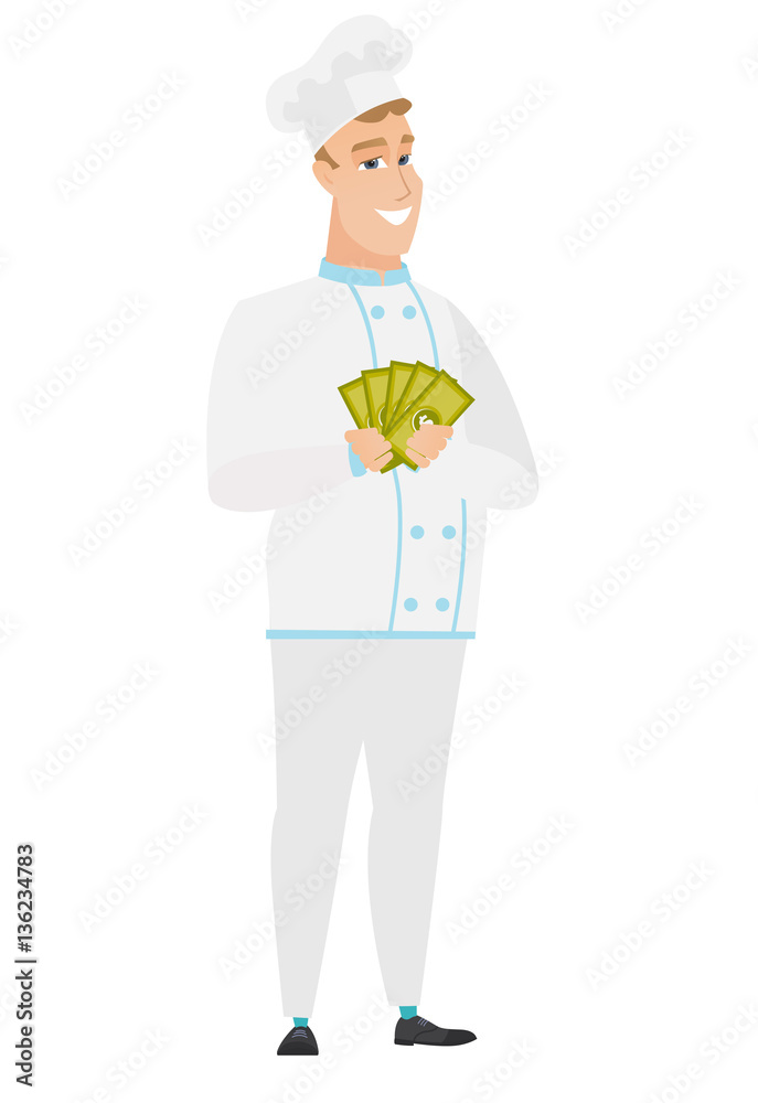 Happy caucasian chef cook holding money. Happy caucasian chef cook holding money.