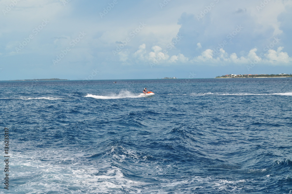 Obraz premium Wake jumping a wave runner