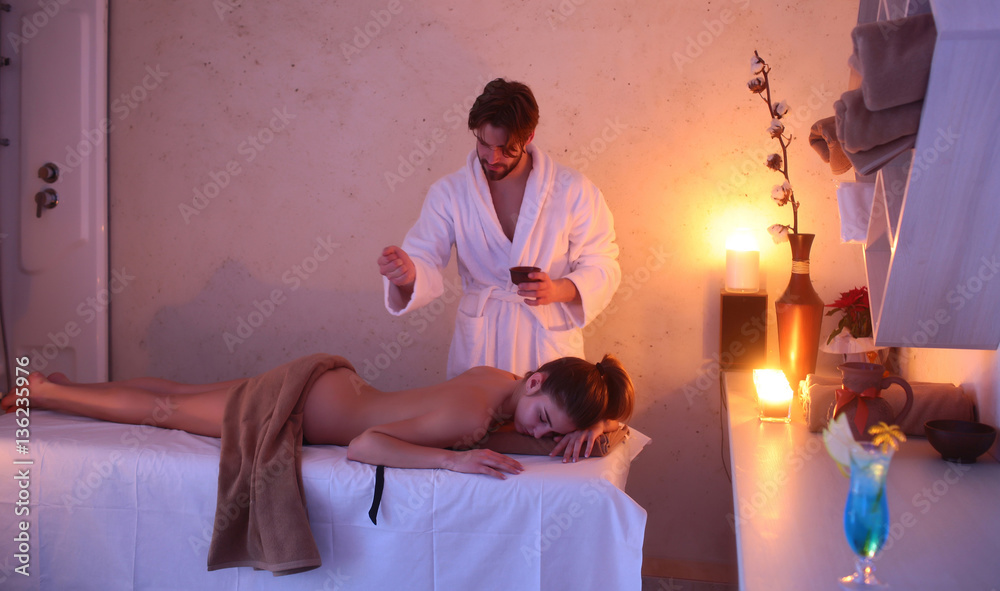 sexy woman on spa salon massage with bearded handsome therapist Stock Photo  | Adobe Stock