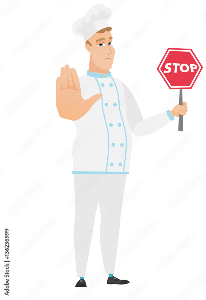 Caucasian chef cook holding stop road sign. Caucasian chef cook holding stop road sign.