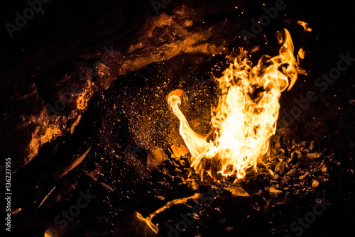 Tablou pe pânză Fire of a charcoal forge, in an old smithy, where the iron was heated to malleab