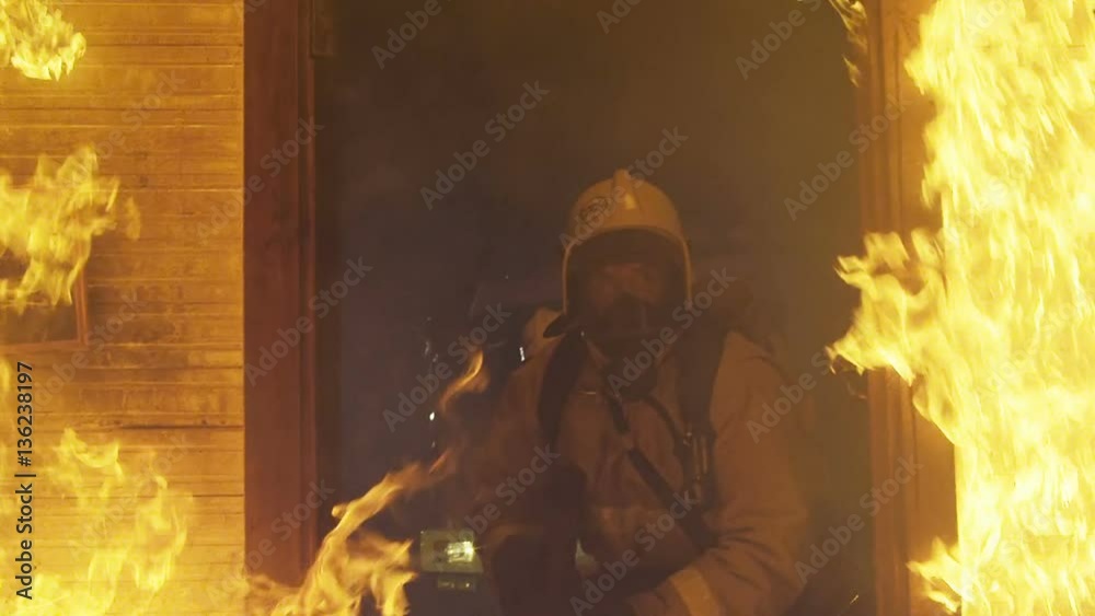 Firemen extinguish a fire