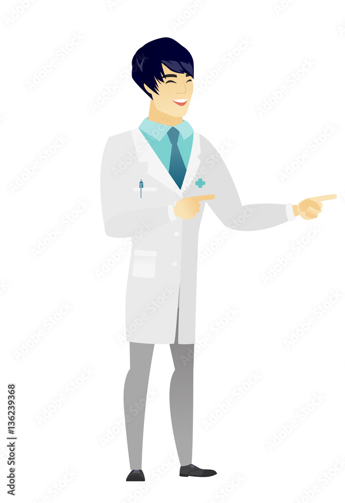 Young asian doctor pointing to the side. Young asian doctor pointing to the side.
