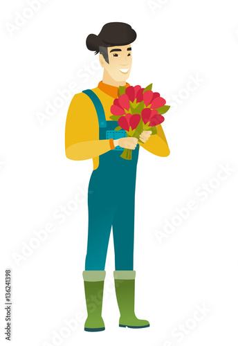 Asian farmer holding a bouquet of flowers