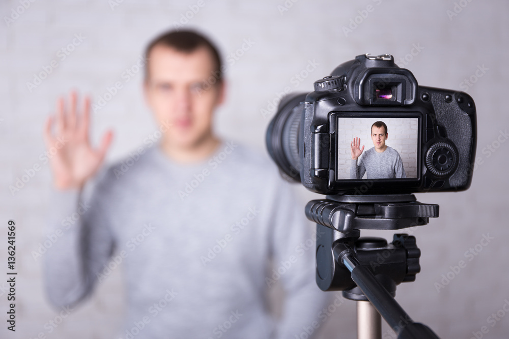 video blogger on screen of modern camera video blogger on screen of modern camera