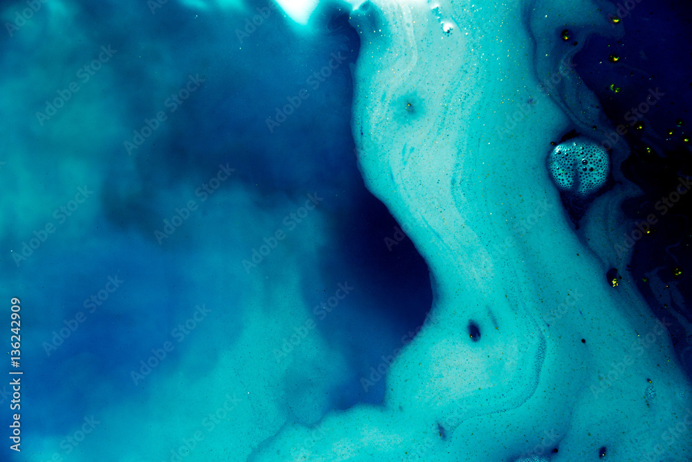 abstract background of ink dissolving in wate