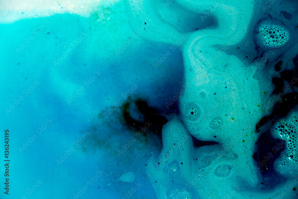 abstract background of ink dissolving in wate