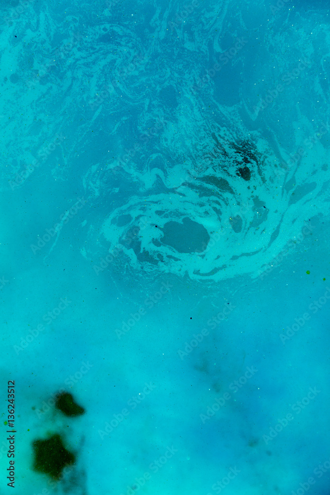 abstract background of ink dissolving in wate