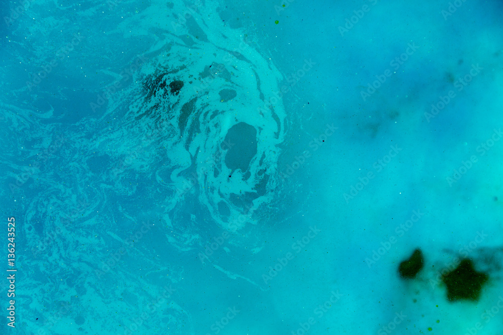 abstract background of ink dissolving in wate